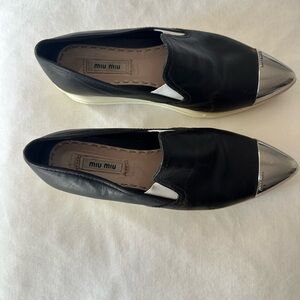 Miu Miu Black Loafers with Metallic Silver Toe